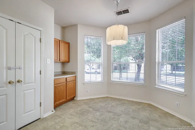 a view of an empty room with window