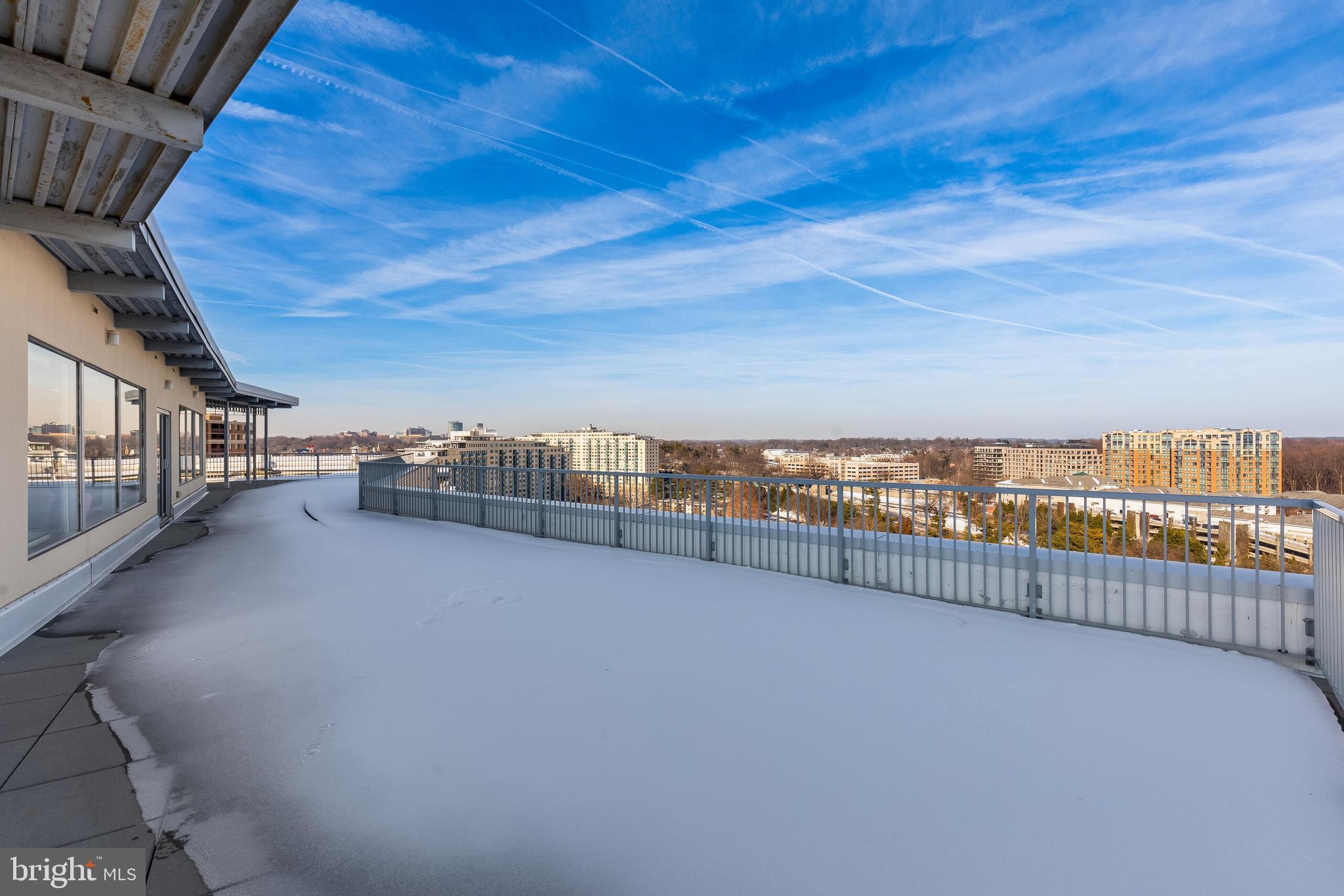 10201 Grosvenor Place, Unit 204 Rockville, MD 20852 - Photo 22 of 25 a view of balcony with city view