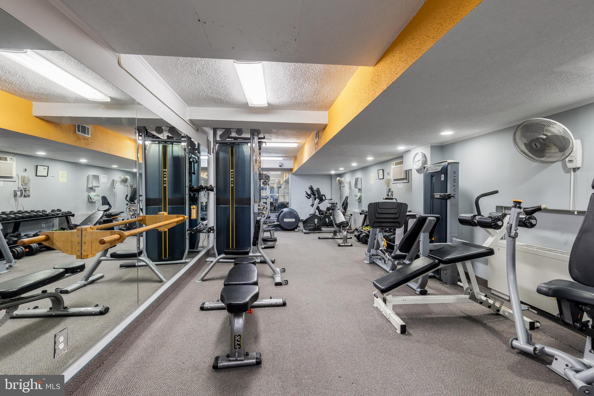10201 Grosvenor Place, Unit 204 Rockville, MD 20852 - Photo 24 of 25 a view of a room with gym equipment