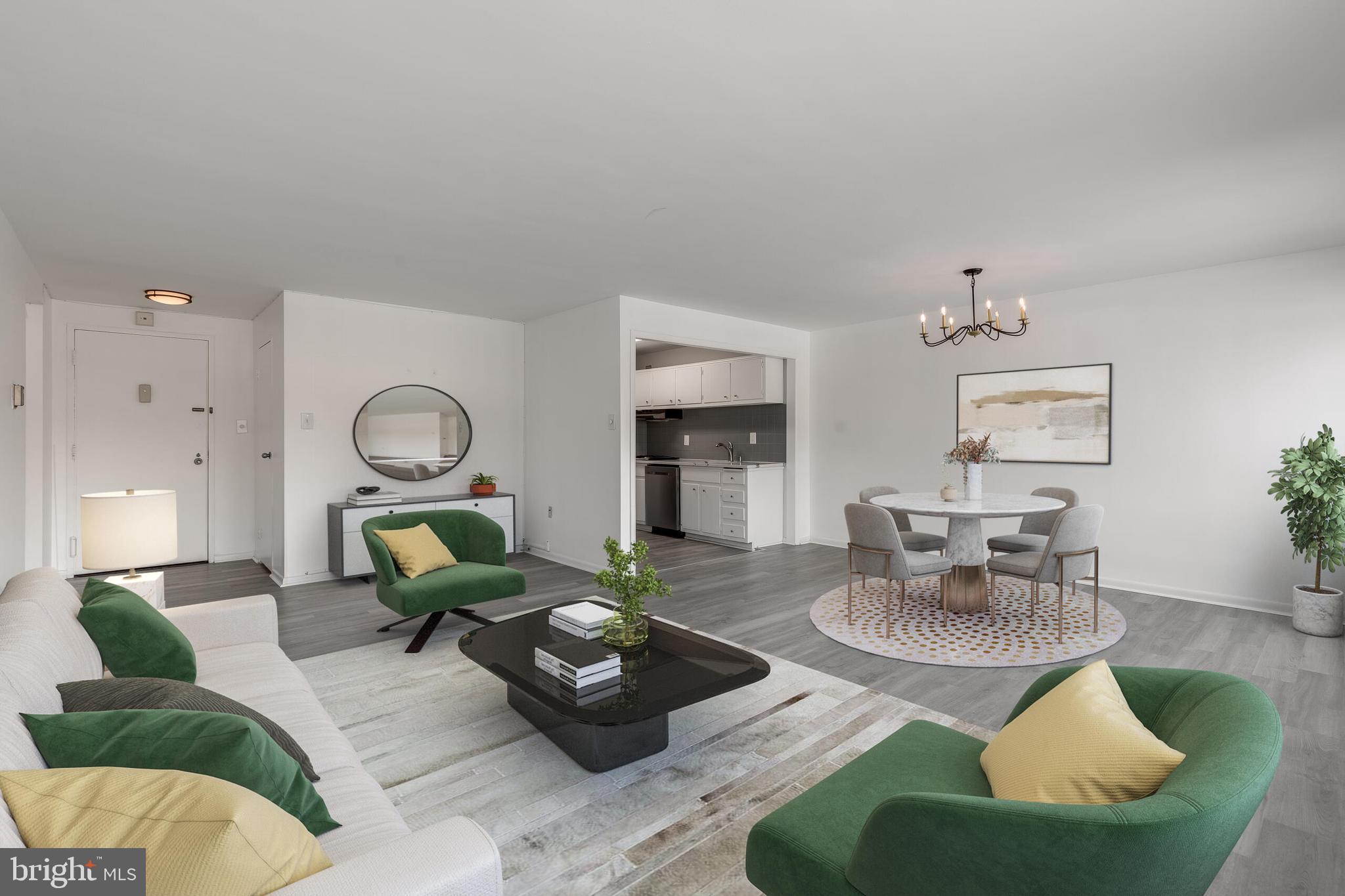 10201 Grosvenor Place, Unit 204 Rockville, MD 20852 - Photo 3 of 25 a living room with furniture