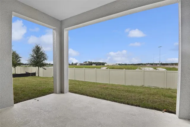 a view of a lake with a big yard