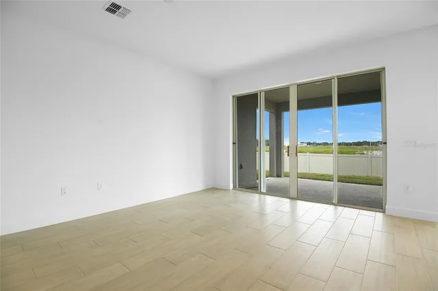 a view of an empty room with window