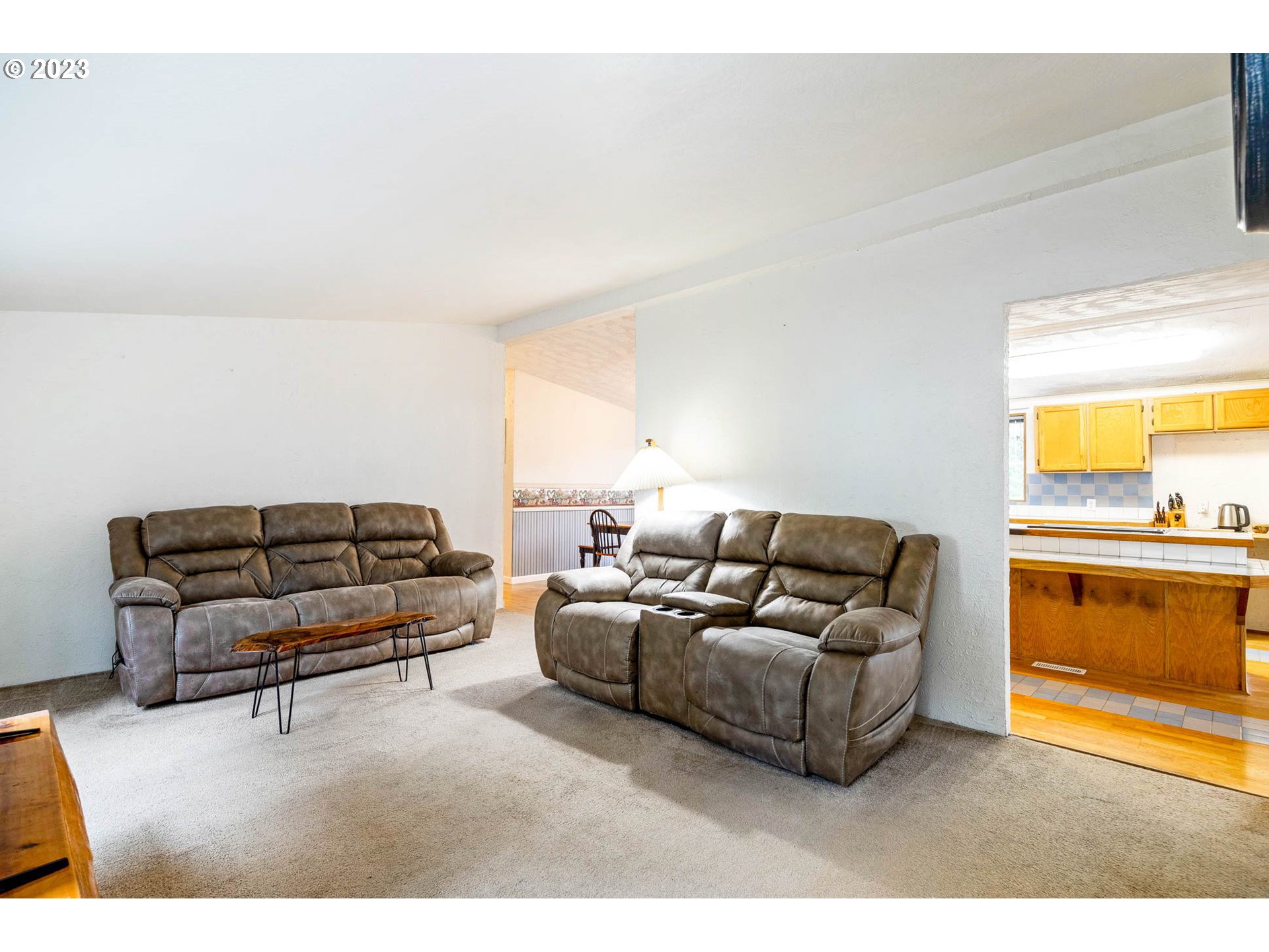 90856 Hill Road Springfield, OR 97478 - Photo 3 of 30 a living room with furniture and a fireplace