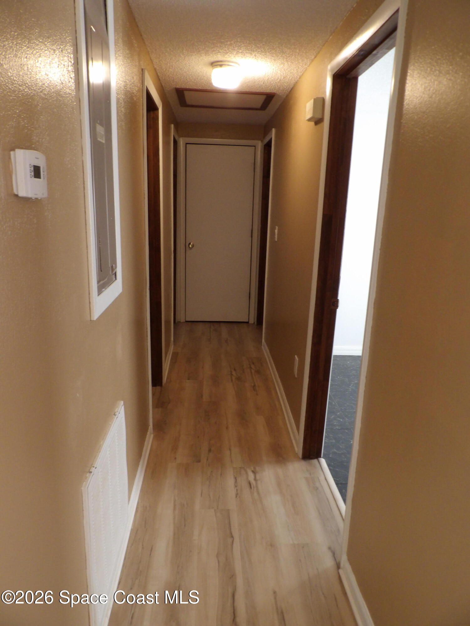 6318 Hudson Road Cocoa, FL 32927 - Photo 17 of 38 a view of hallway with stairs