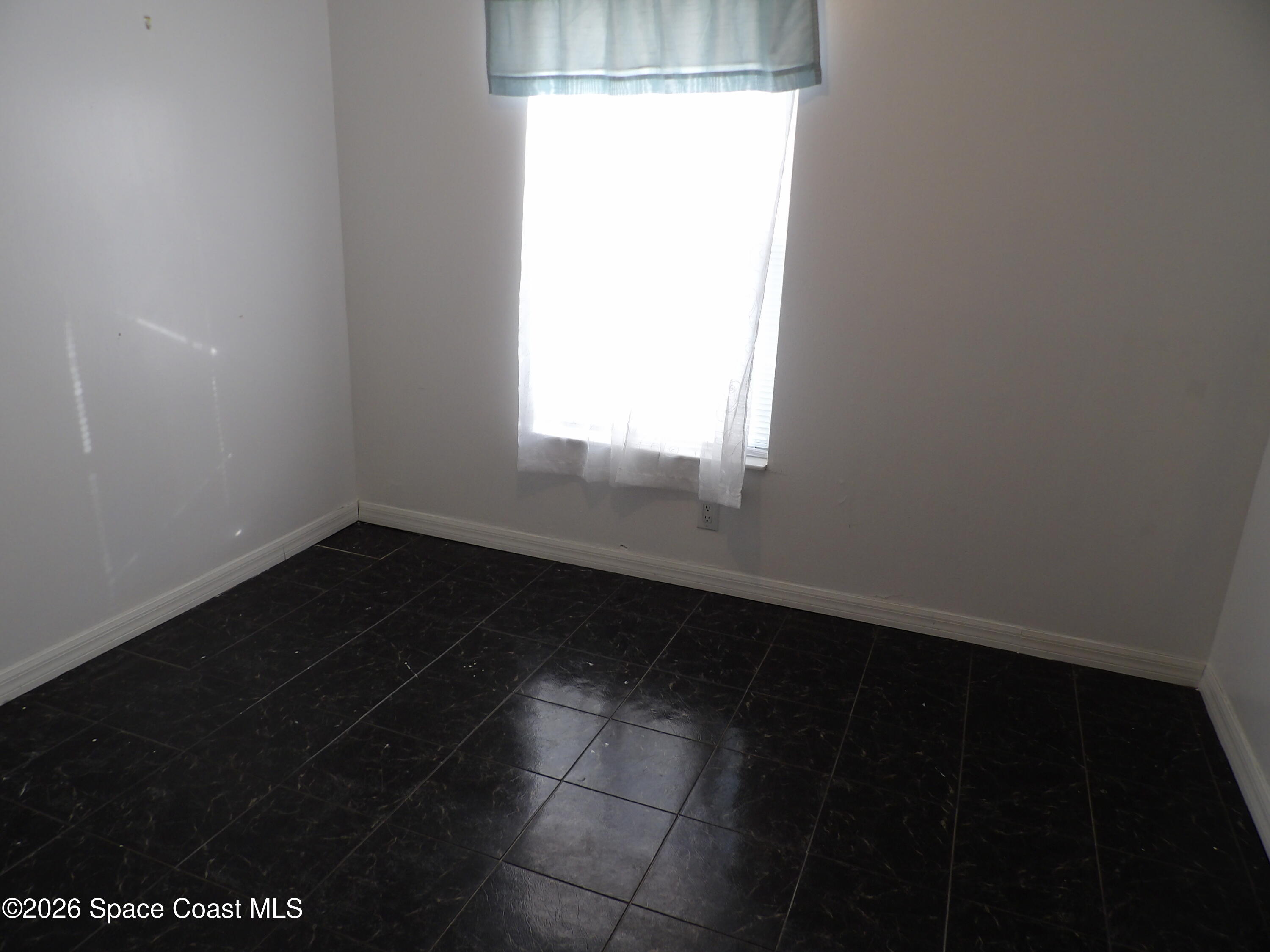 6318 Hudson Road Cocoa, FL 32927 - Photo 20 of 38 a view of an empty room and window
