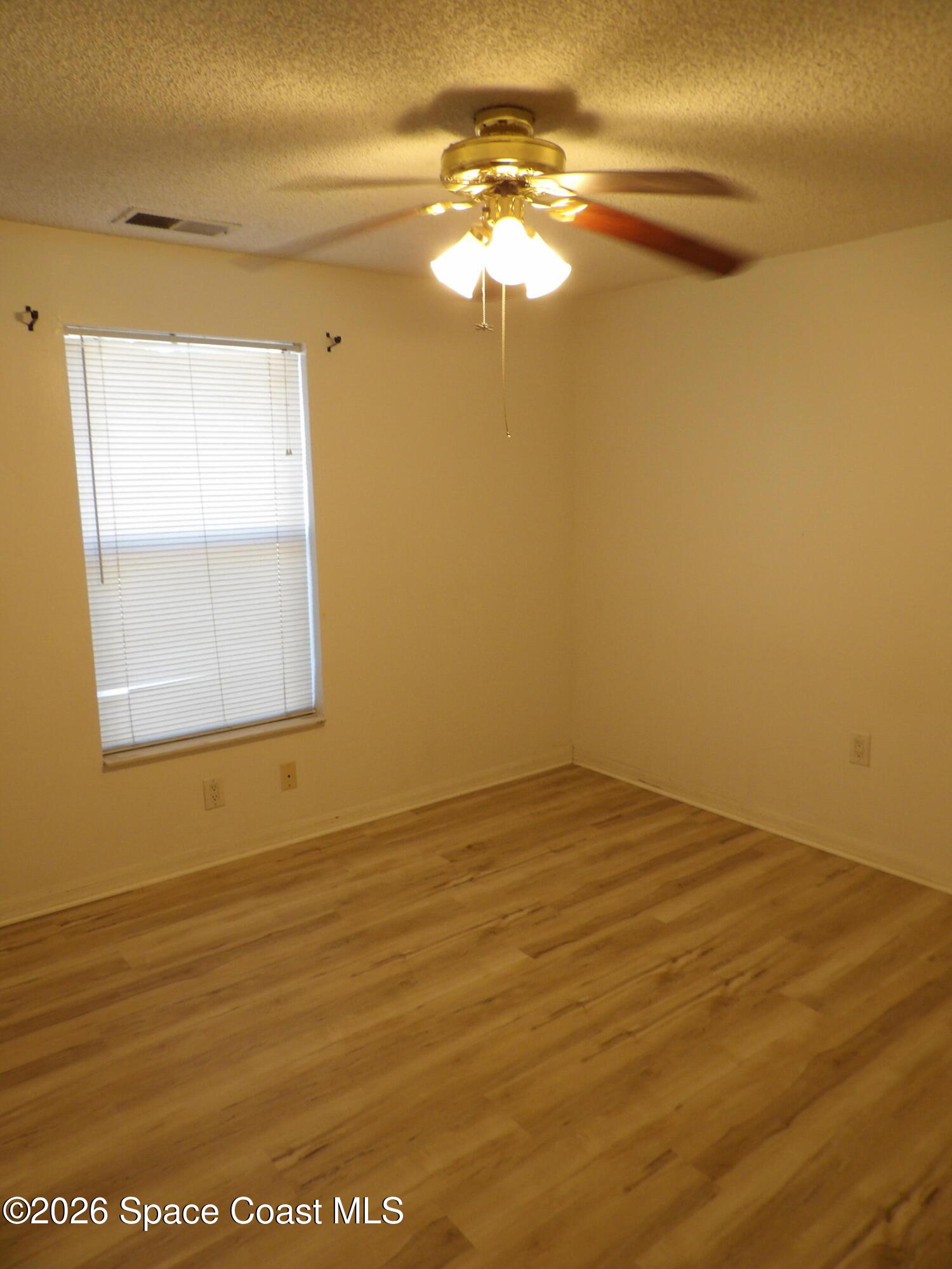 6318 Hudson Road Cocoa, FL 32927 - Photo 27 of 38 a view of empty room with window