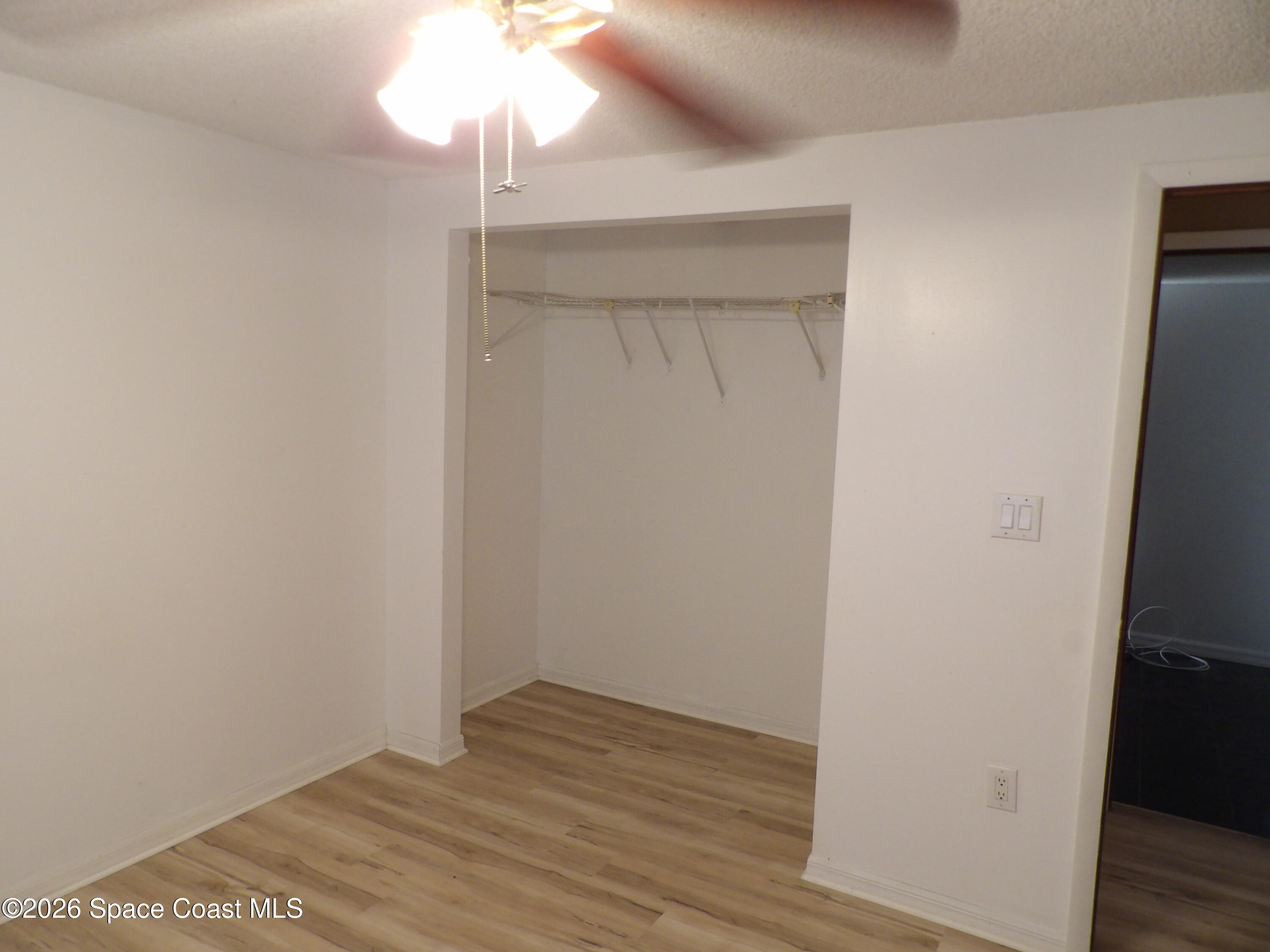 6318 Hudson Road Cocoa, FL 32927 - Photo 29 of 38 a view of small space with wooden floor