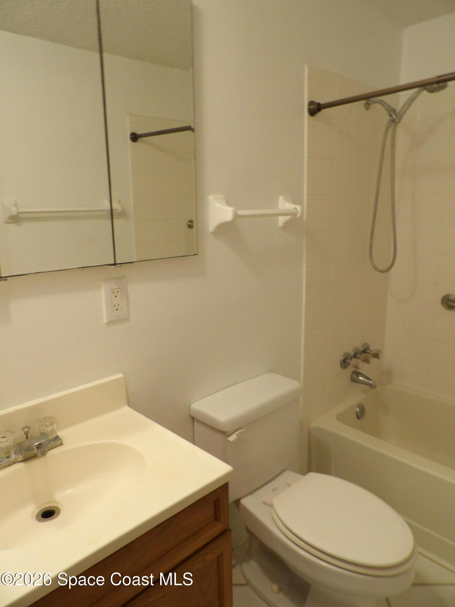 6318 Hudson Road Cocoa, FL 32927 - Photo 30 of 38 a white toilet sitting next to a bath tub