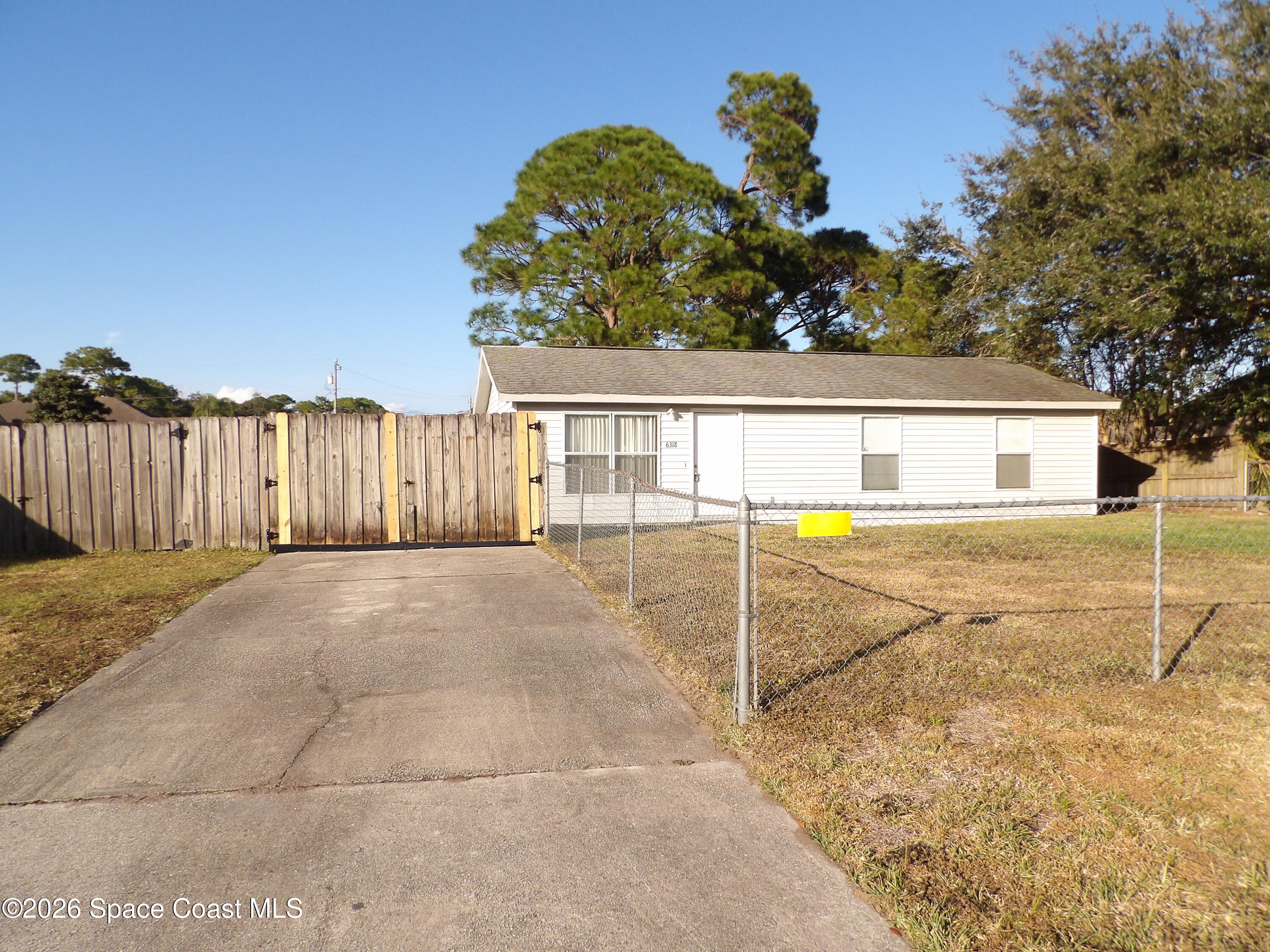 6318 Hudson Road Cocoa, FL 32927 - Photo 3 of 38 a view of a backyard