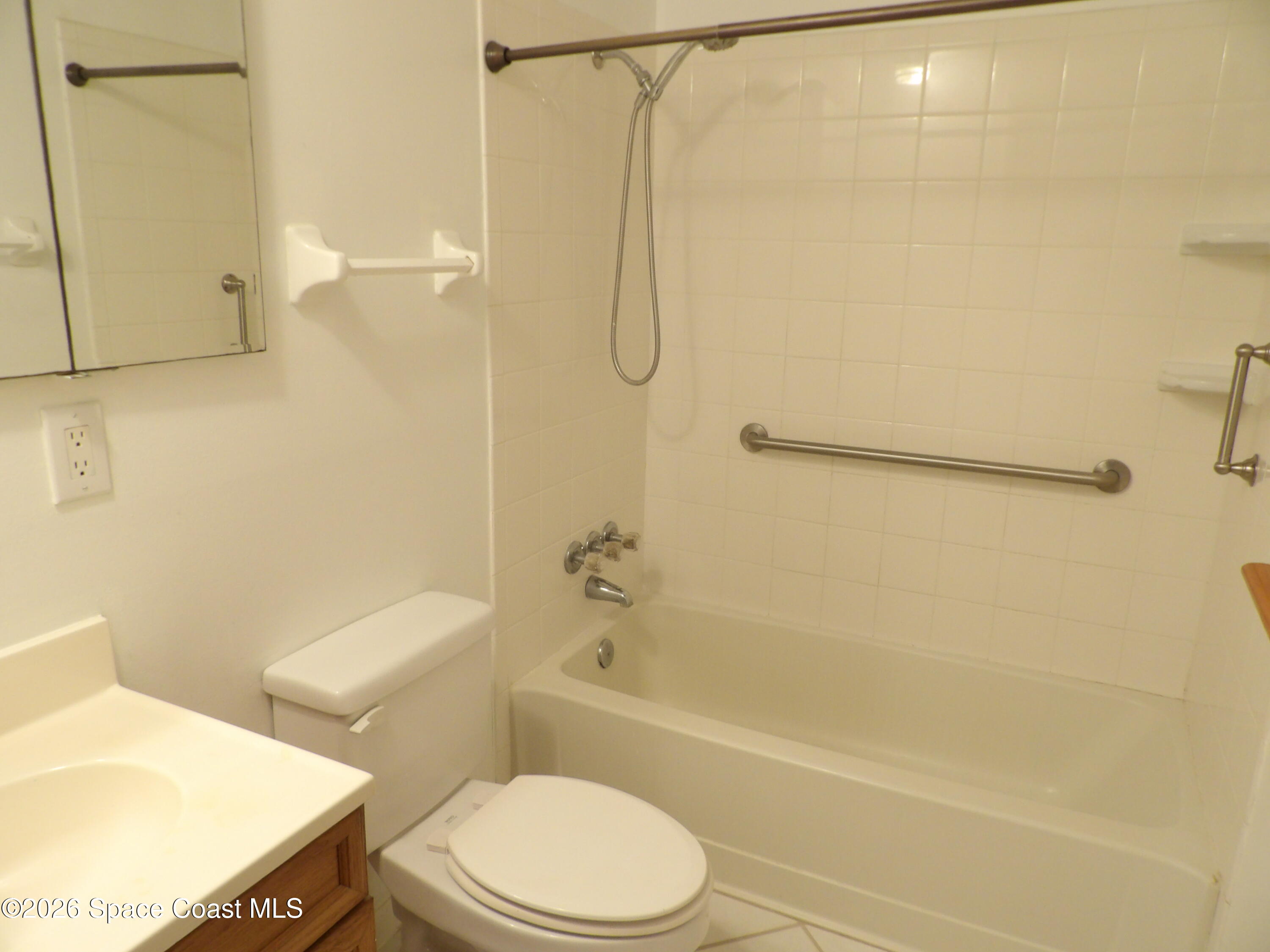 6318 Hudson Road Cocoa, FL 32927 - Photo 31 of 38 a bathroom with a toilet and a shower