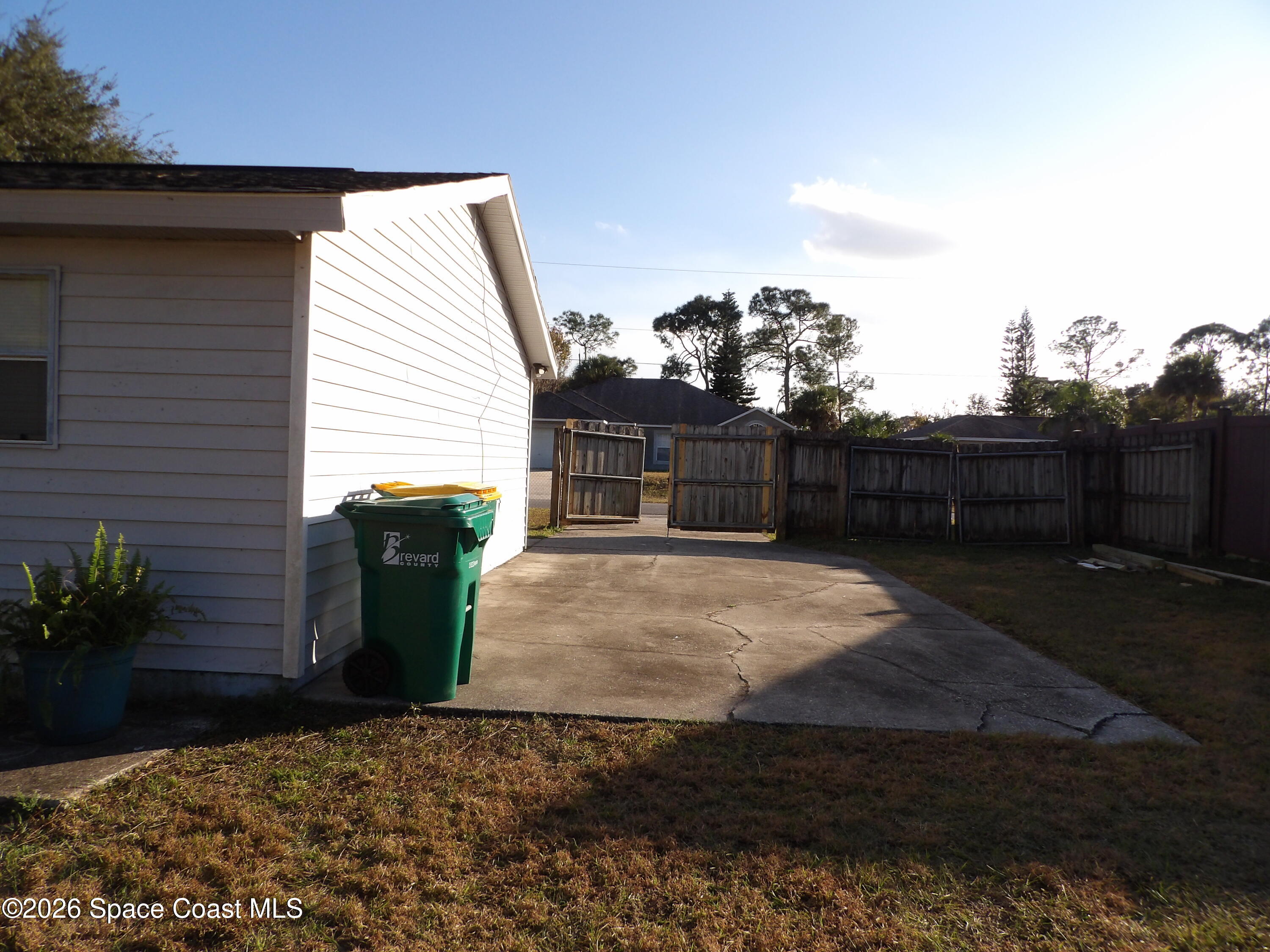 6318 Hudson Road Cocoa, FL 32927 - Photo 36 of 38 a view of house with backyard space