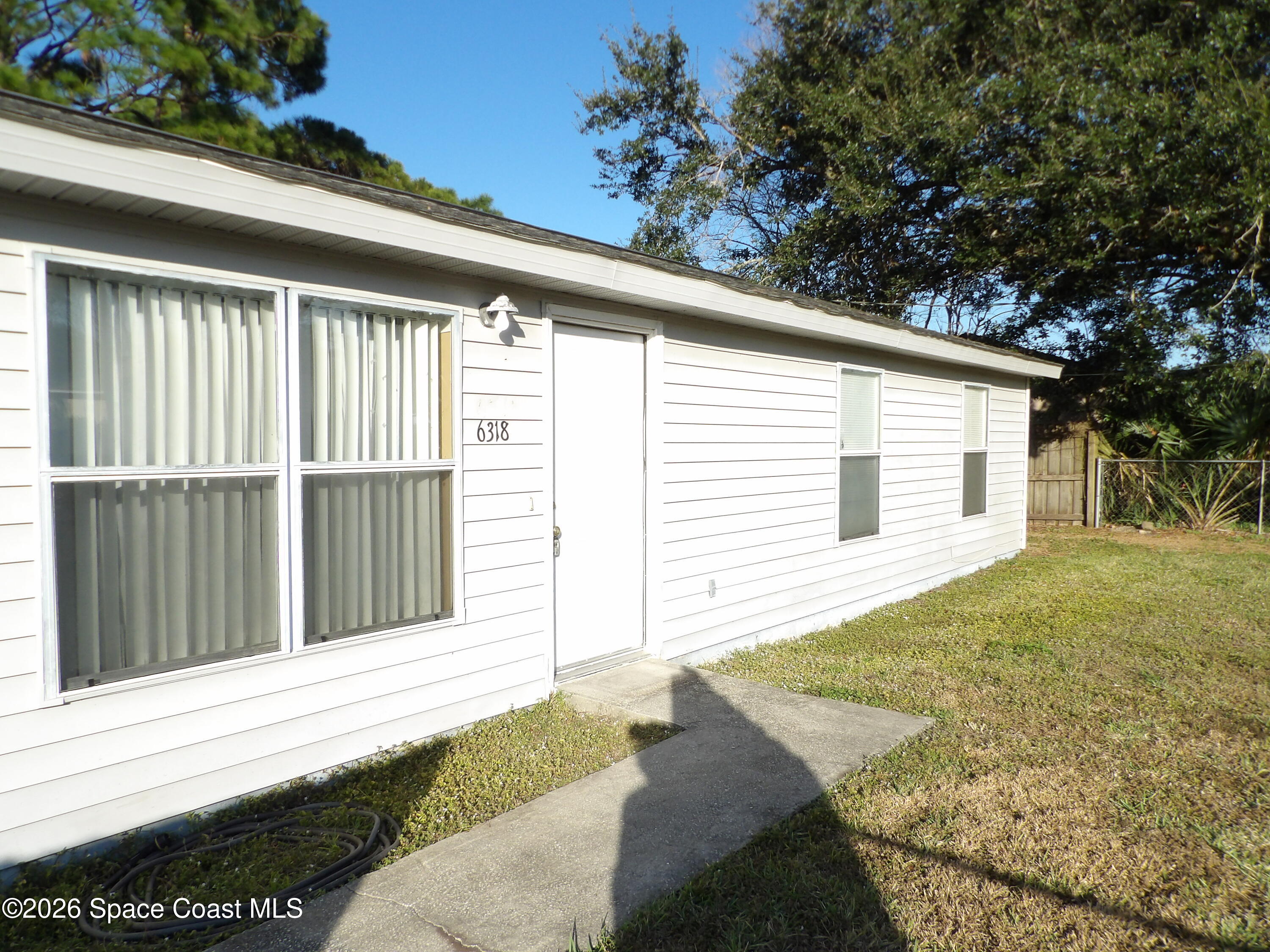 6318 Hudson Road Cocoa, FL 32927 - Photo 6 of 38 a view of a house with a backyard