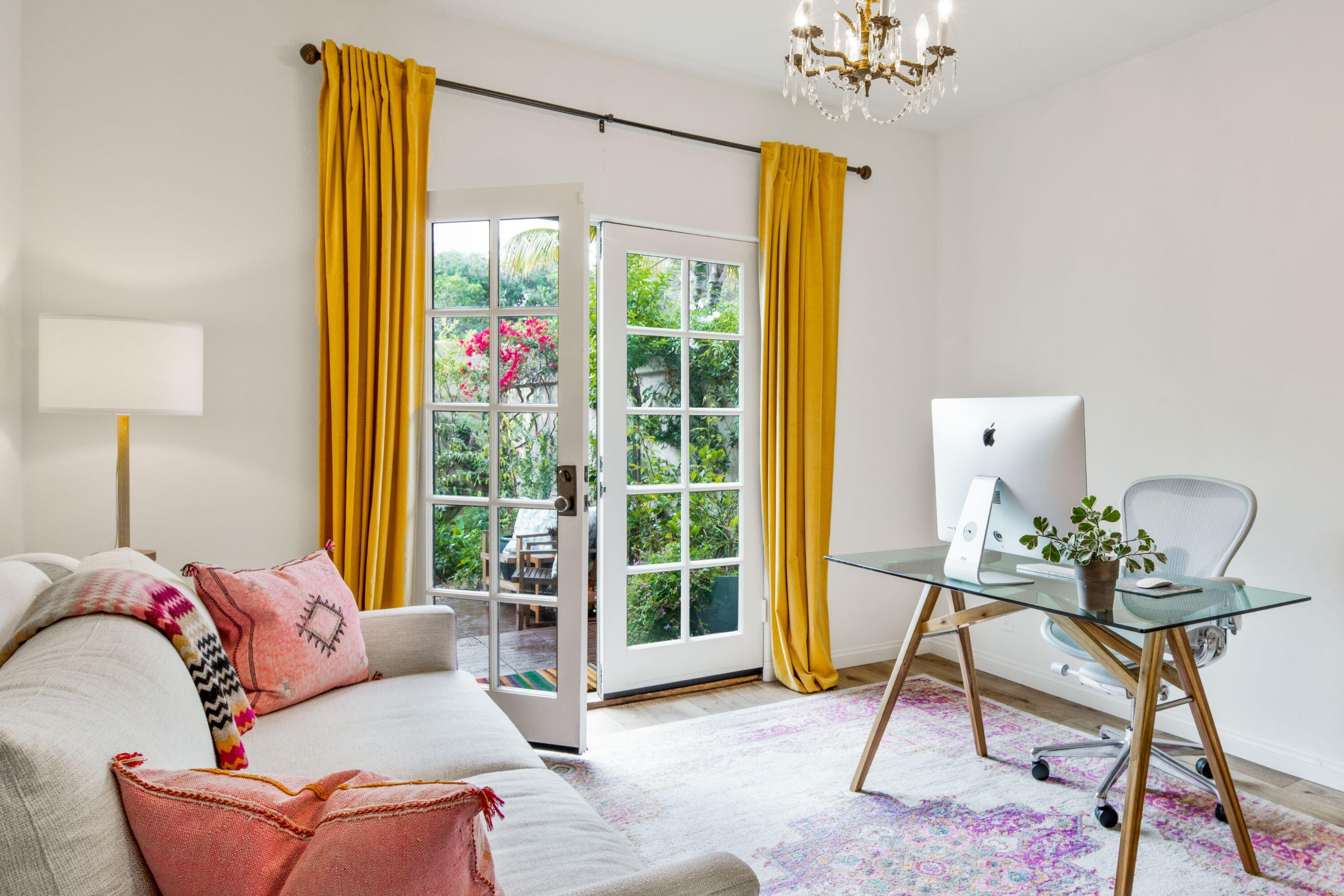 81 Depot Road Santa Barbara, CA 93108 - Photo 11 of 21 a living room with furniture and a large window