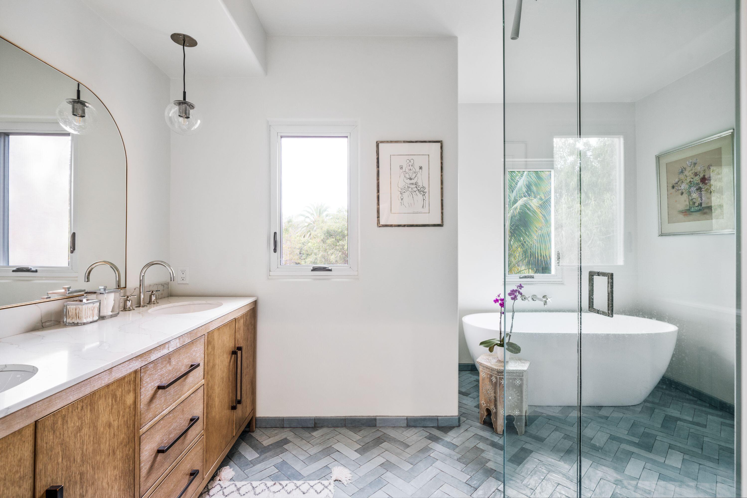 81 Depot Road Santa Barbara, CA 93108 - Photo 15 of 21 a spacious bathroom with a double vanity sink tub and mirror