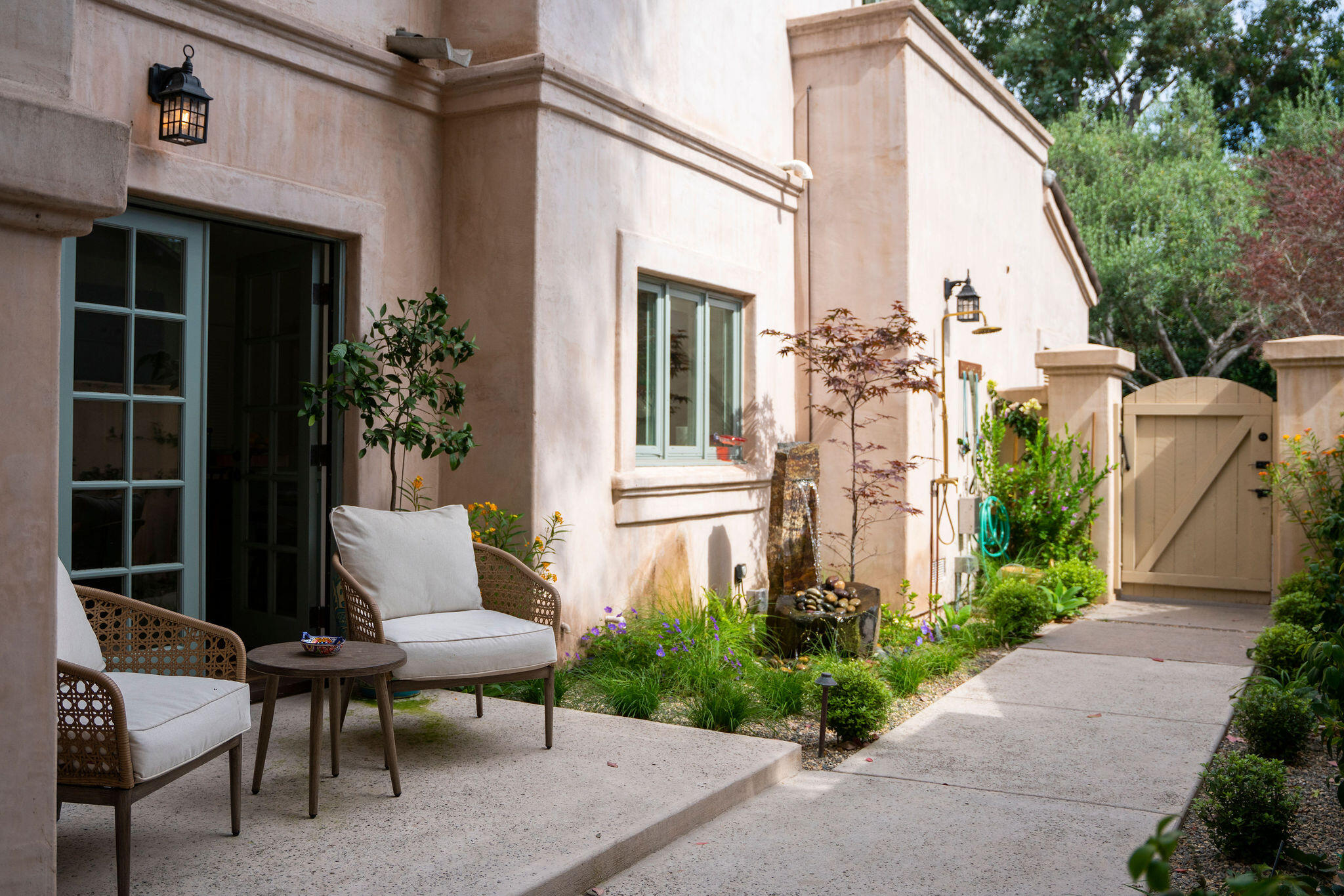 81 Depot Road Santa Barbara, CA 93108 - Photo 18 of 21 a view of a patio with table and chairs and potted plants