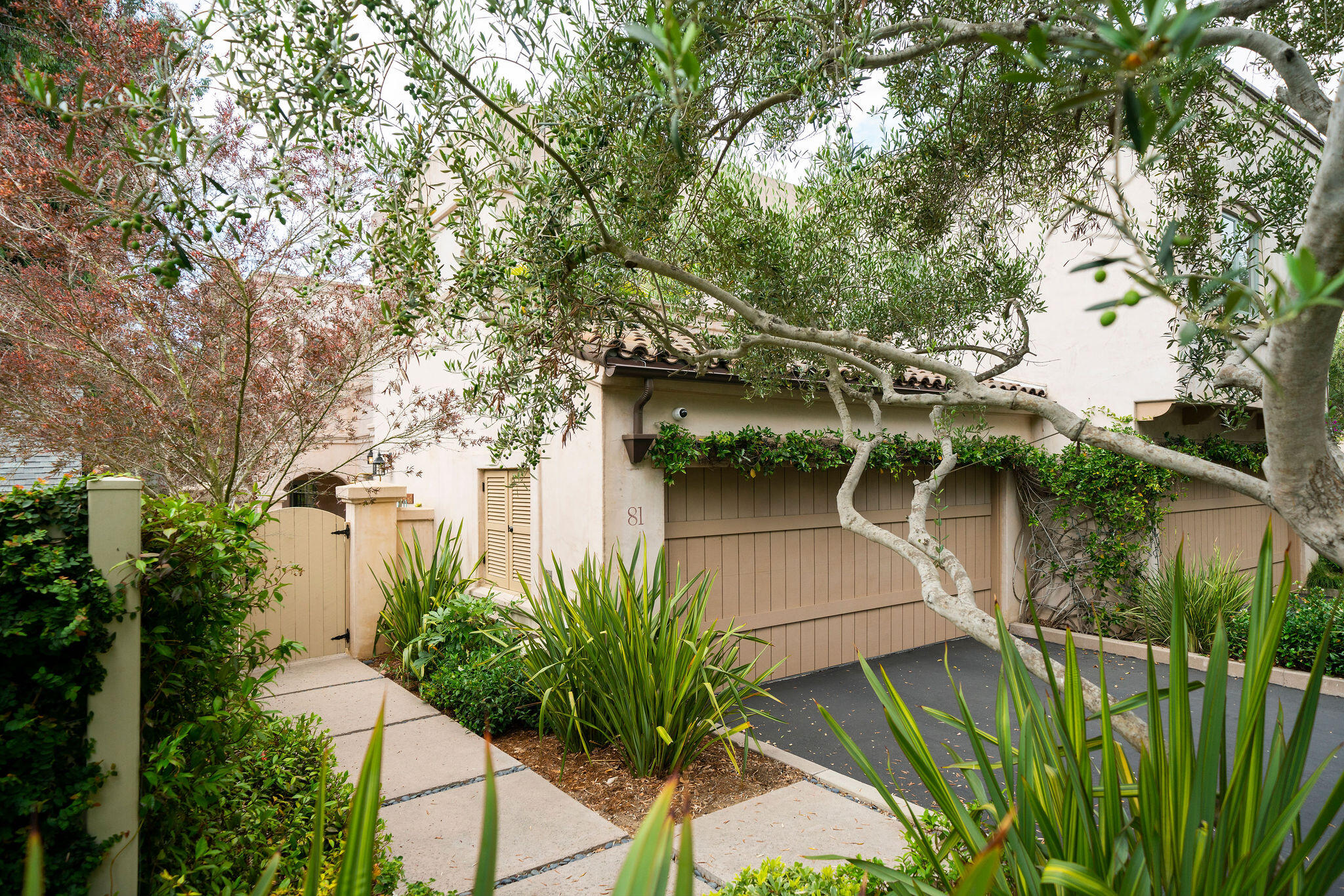 81 Depot Road Santa Barbara, CA 93108 - Photo 20 of 21 a backyard of a house with lots of green space and plants