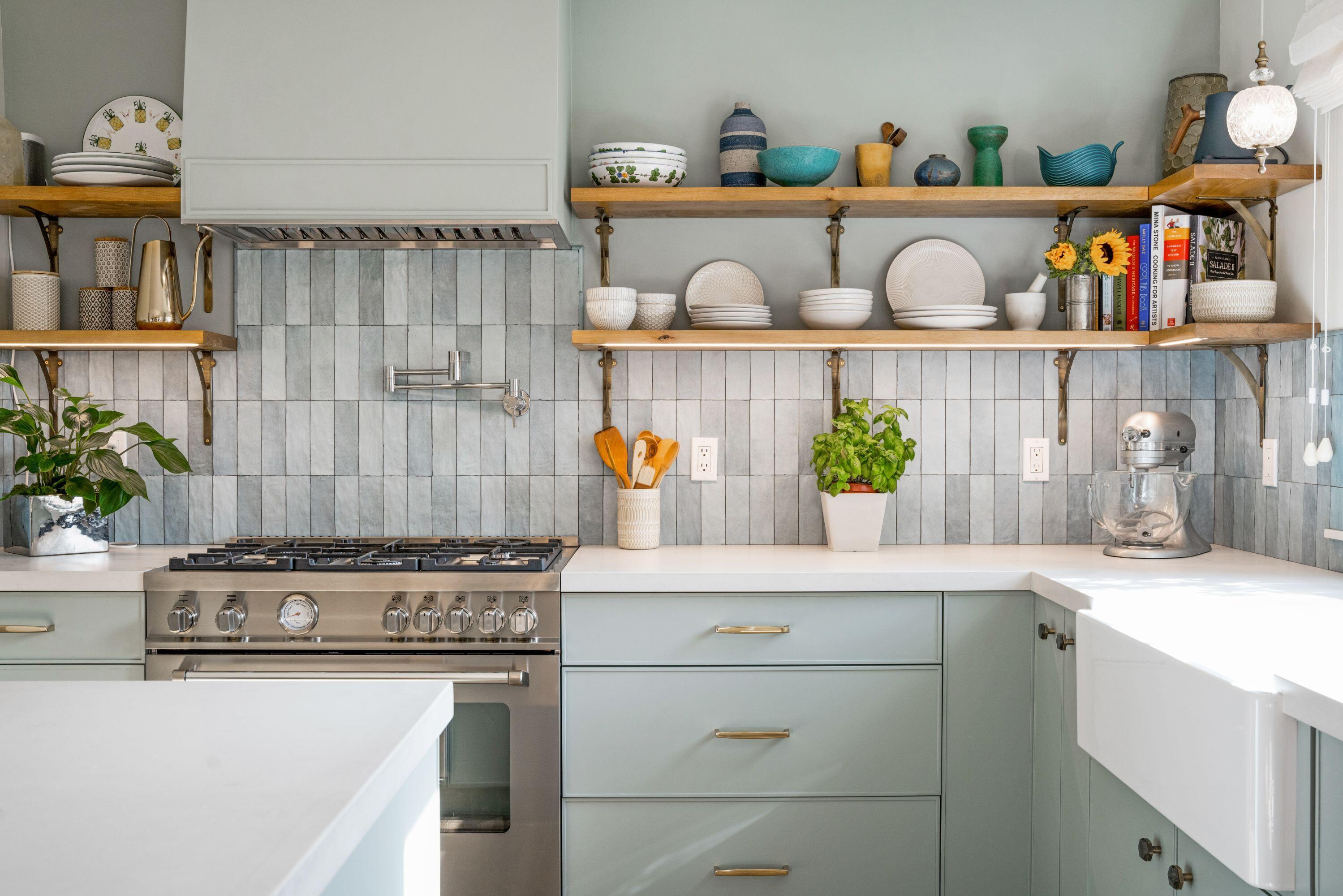 81 Depot Road Santa Barbara, CA 93108 - Photo 2 of 21 a kitchen with a stove and a potted plant