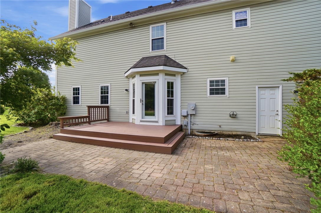 10 Chase Court Springboro, OH 45066 - Photo 65 of 75 The outdoor deck and paved patio create an inviting space for leisure and entertaining.