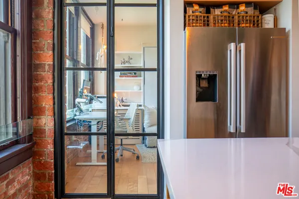 a kitchen with a stove and cabinets