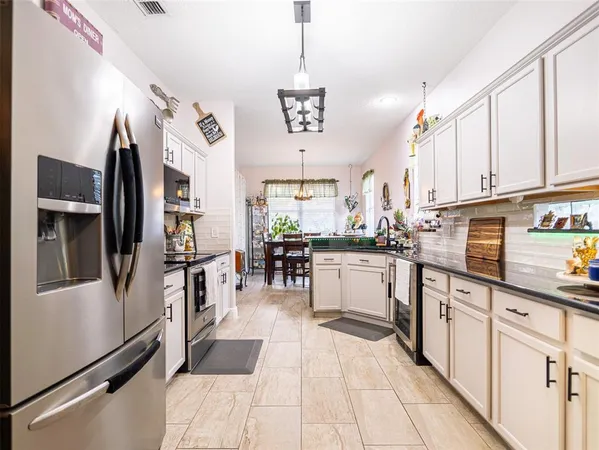 $495,000 | 10196 Andover Point Circle, Orlando, FL 32825