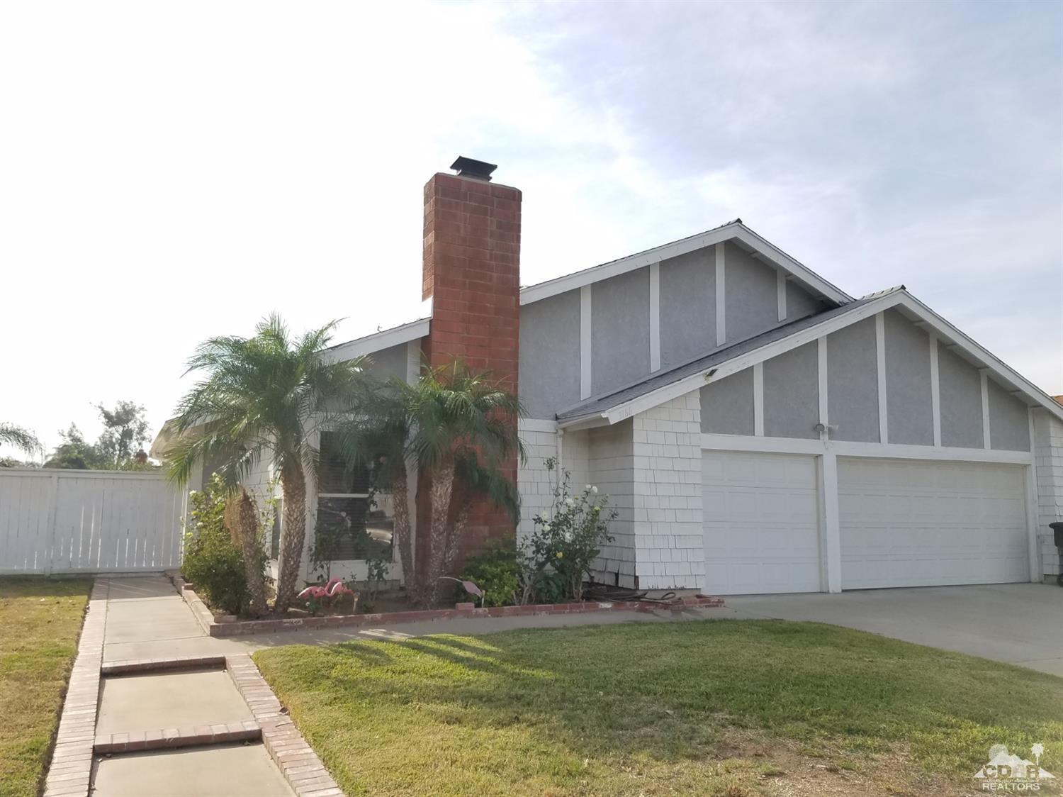 3166 Tomahawk Circle Riverside, CA 92503 - Photo 1 of 29 a front view of a house with a yard