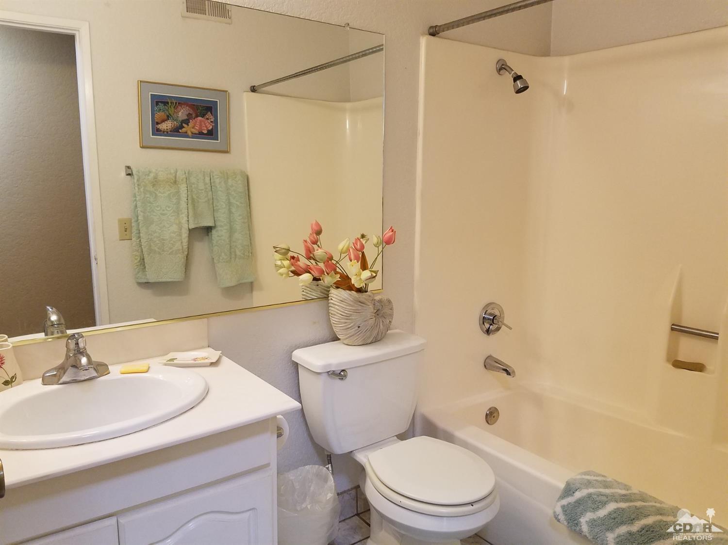 3166 Tomahawk Circle Riverside, CA 92503 - Photo 17 of 29 a bathroom with a sink a toilet and shower