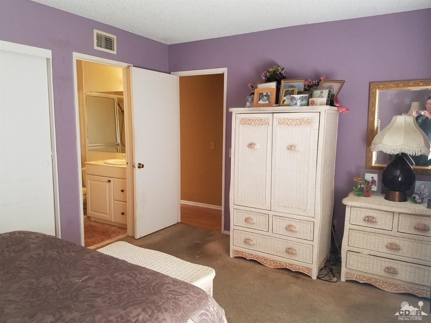 3166 Tomahawk Circle Riverside, CA 92503 - Photo 20 of 29 a bedroom with a bed and a closet