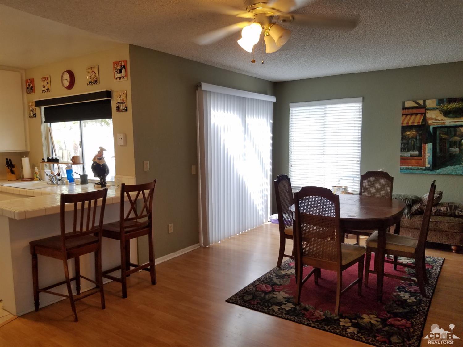 3166 Tomahawk Circle Riverside, CA 92503 - Photo 26 of 29 a view of a dining room with furniture and window