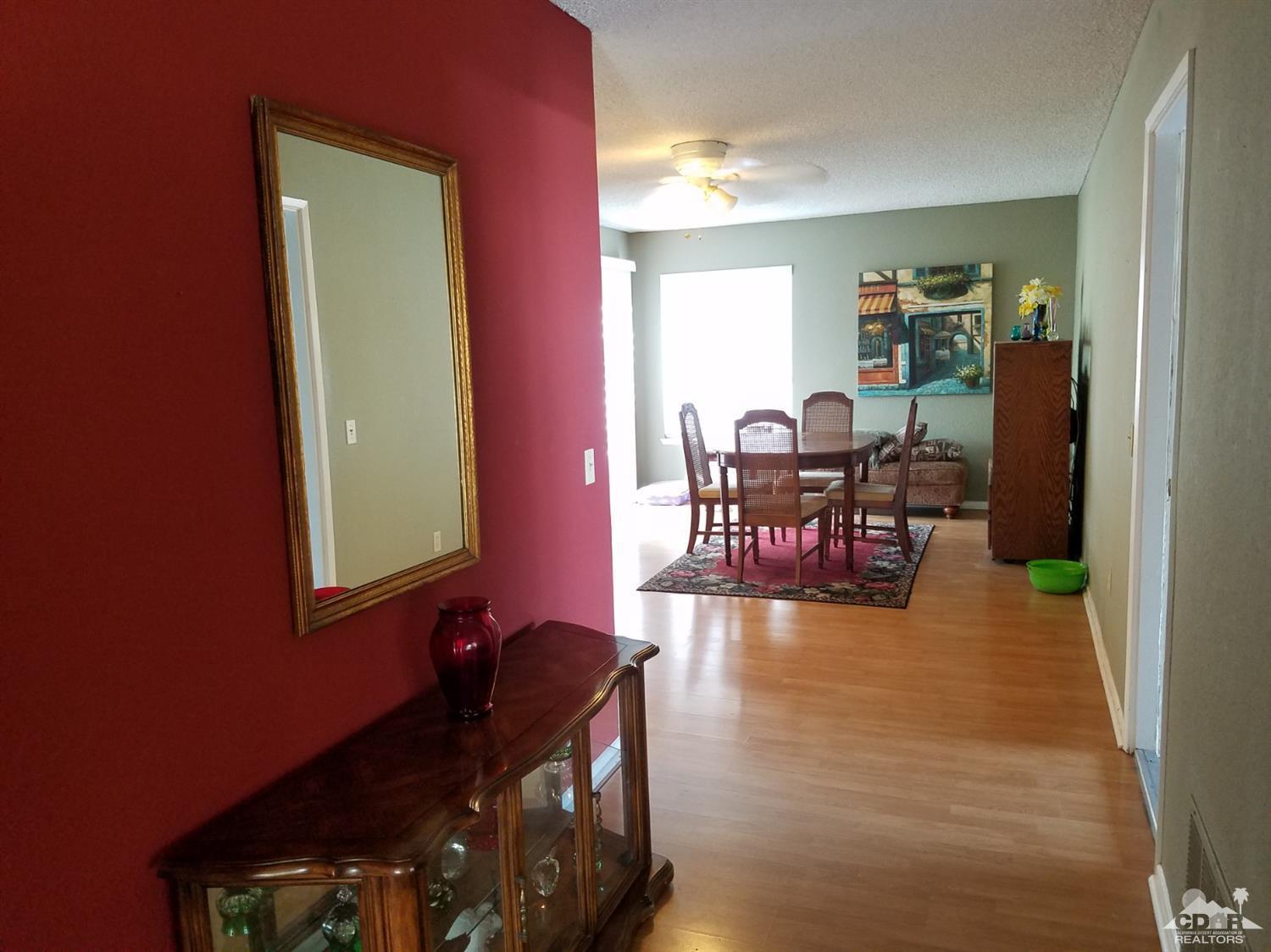 3166 Tomahawk Circle Riverside, CA 92503 - Photo 27 of 29 a dining room with furniture and wooden floor