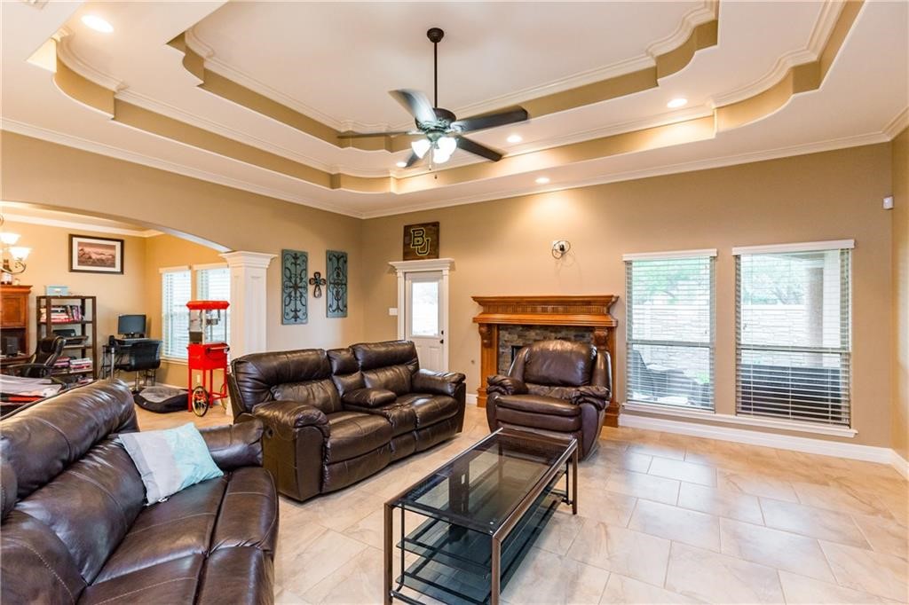 1306 Keenland Road Corpus Christi, TX 78418 - Photo 8 of 26 a living room with furniture large window and fireplace