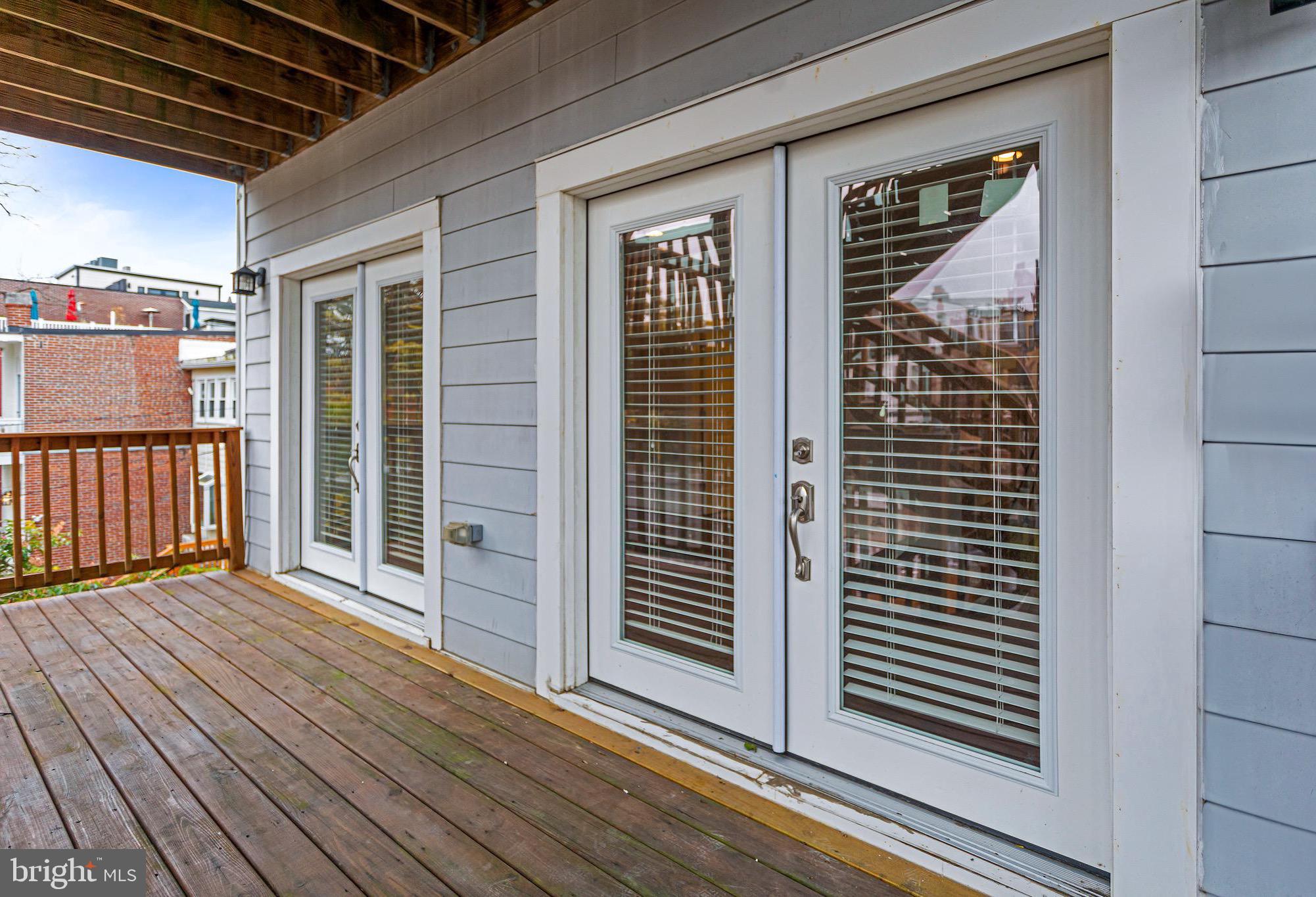 1221 Kenyon Street Northwest, Unit 2 Washington, DC 20010 - Photo 11 of 26 a view of a balcony with wooden floor