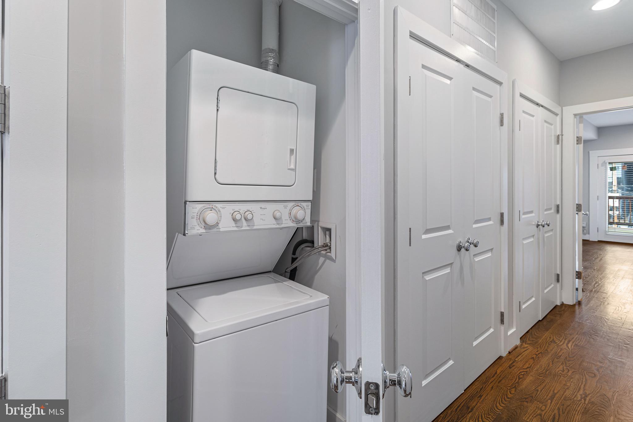1221 Kenyon Street Northwest, Unit 2 Washington, DC 20010 - Photo 20 of 26 a view of bathroom with a washer and dryer