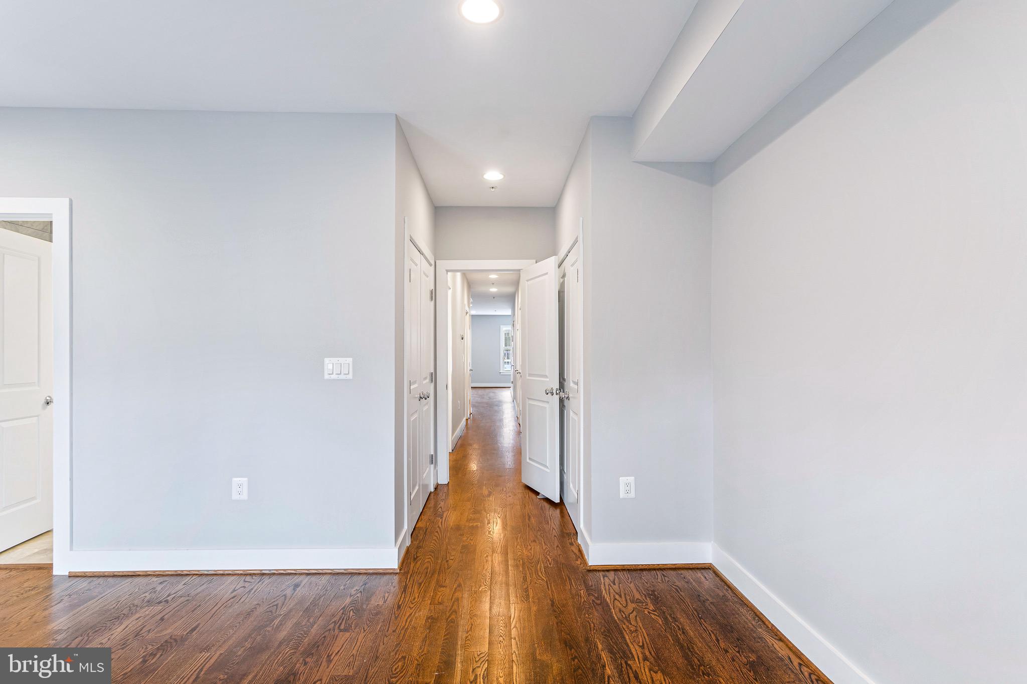 1221 Kenyon Street Northwest, Unit 2 Washington, DC 20010 - Photo 7 of 26 a view of a hallway with wooden floor