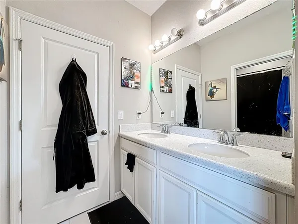 a white toilet sitting next to a shower curtain