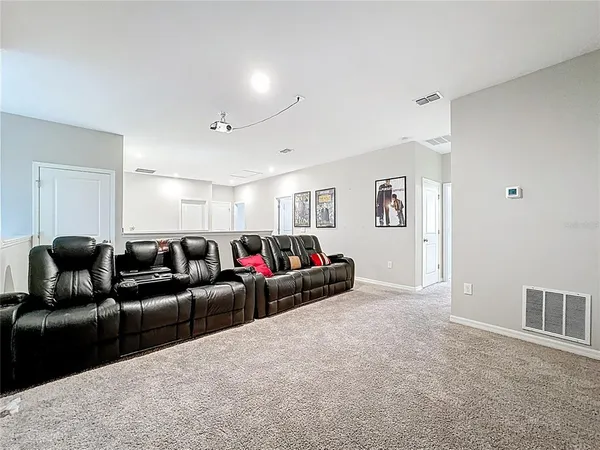 an aerial view of a house with a ocean view