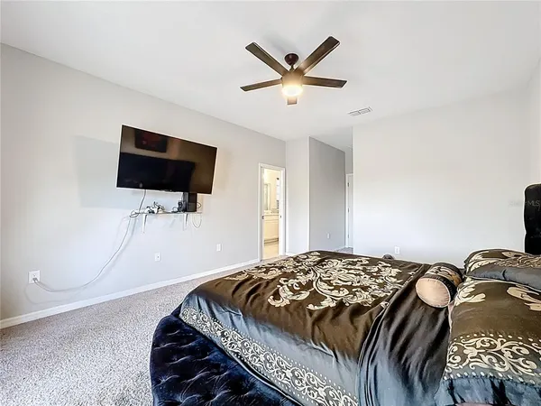 a view of an empty room and closet