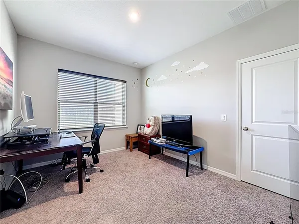 a view of a house with a ocean view