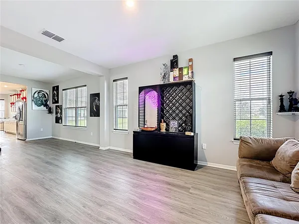 a kitchen with cabinets a sink and appliances