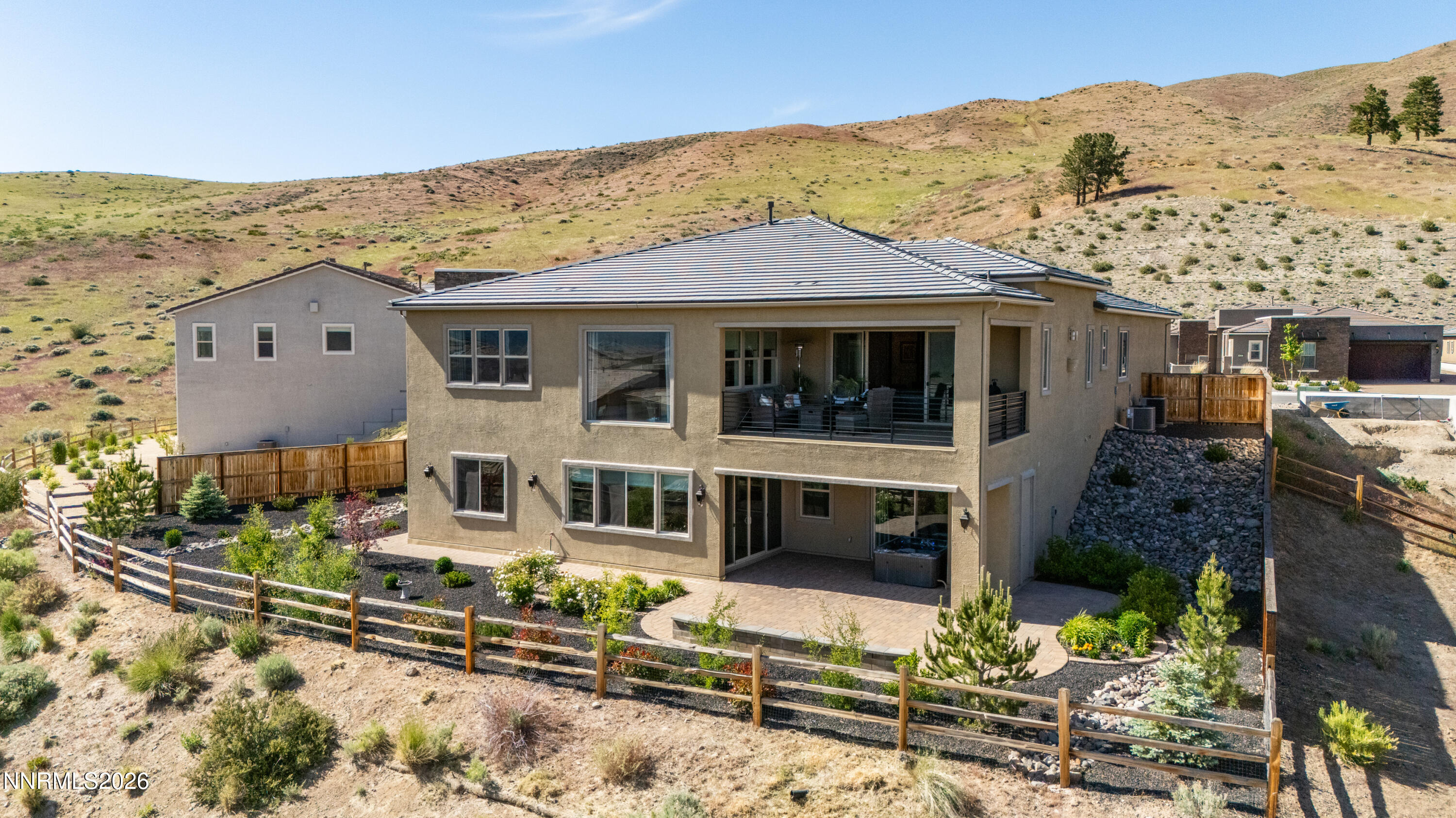9028 Iron Sky Court Reno, NV 89523 - Photo 29 of 36 front view of a house with a large tree
