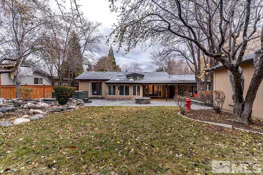 2075 Marsh Avenue Reno, NV 89509 - Photo 30 of 32 a view of a house with a yard
