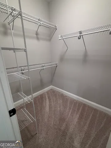 a view of a room with racks on the wall