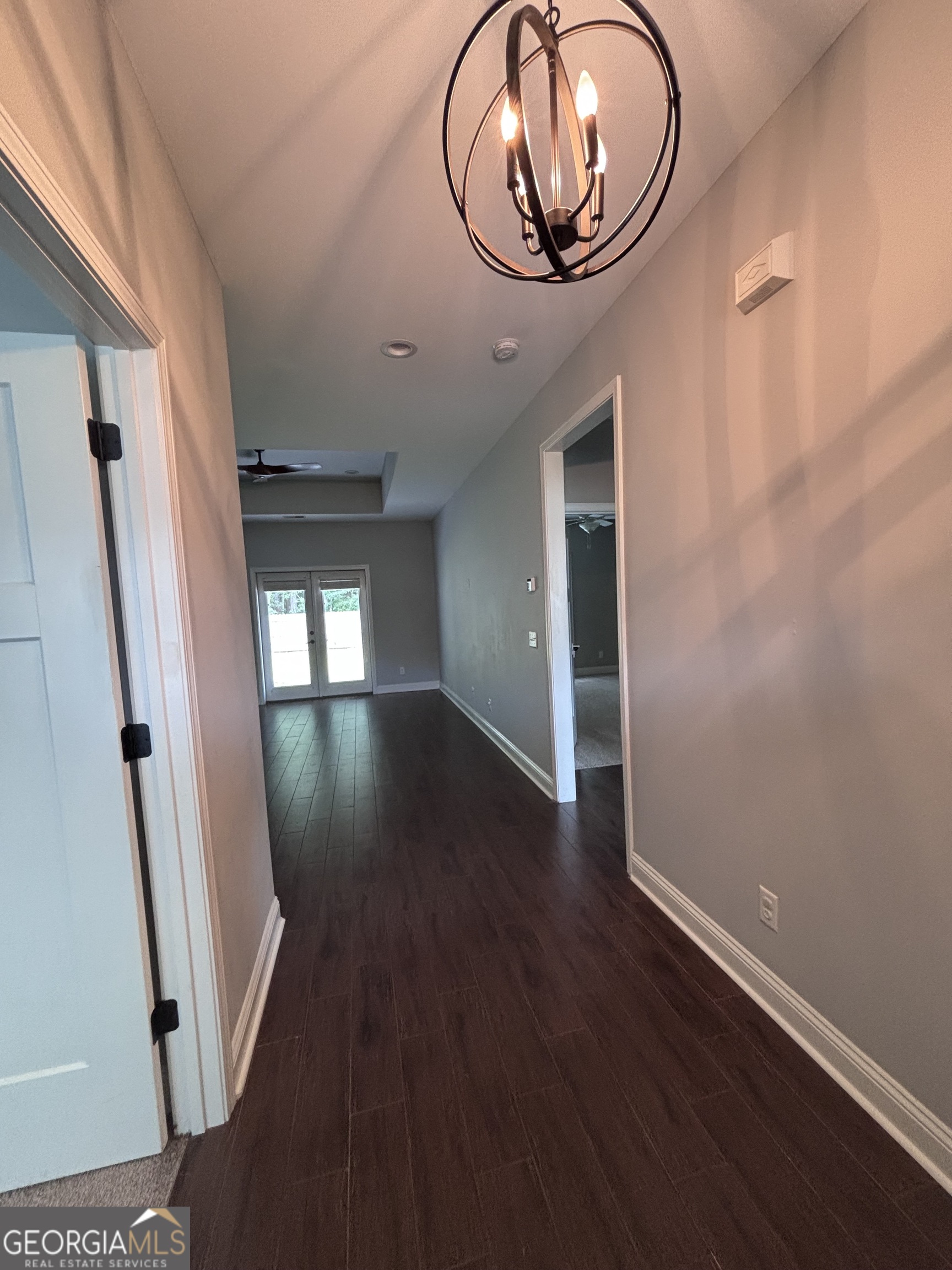 106 Logans Way Kingsland, GA 31548 - Photo 2 of 15 an entryway in a house with wooden floor