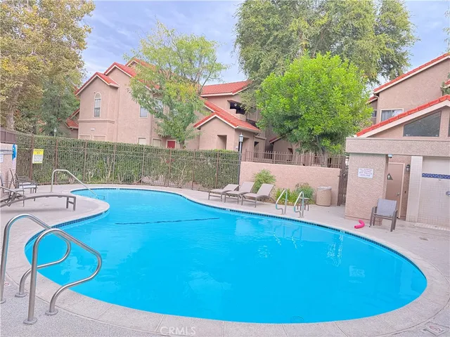 a view of a house with swimming pool