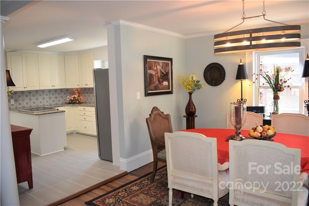 1301 Jackson Road Gastonia, NC 28052 - Photo 14 of 44 a dining room with furniture and window