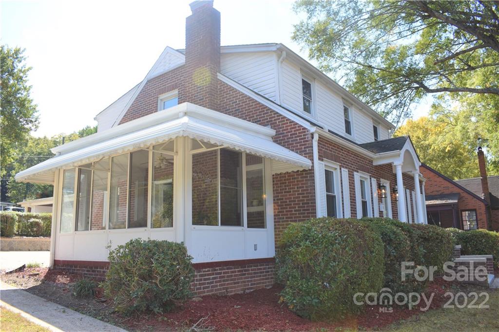 1301 Jackson Road Gastonia, NC 28052 - Photo 2 of 44 a front view of a house with a garden