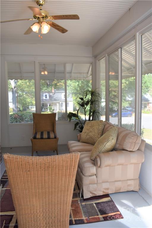 1301 Jackson Road Gastonia, NC 28052 - Photo 21 of 44 a living room with furniture and a large window with garden view