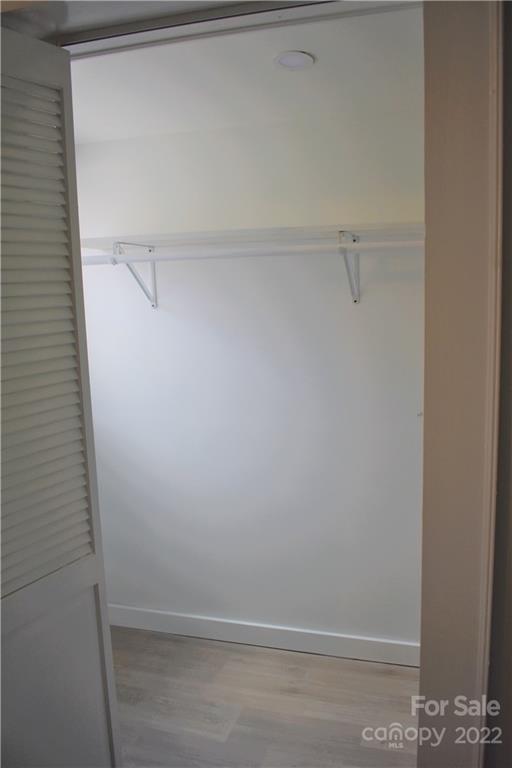 1301 Jackson Road Gastonia, NC 28052 - Photo 24 of 44 a view of a room with racks on the wall