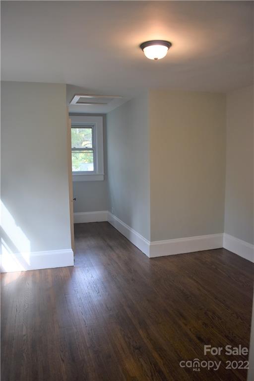 1301 Jackson Road Gastonia, NC 28052 - Photo 36 of 44 an empty room with wooden floor and windows