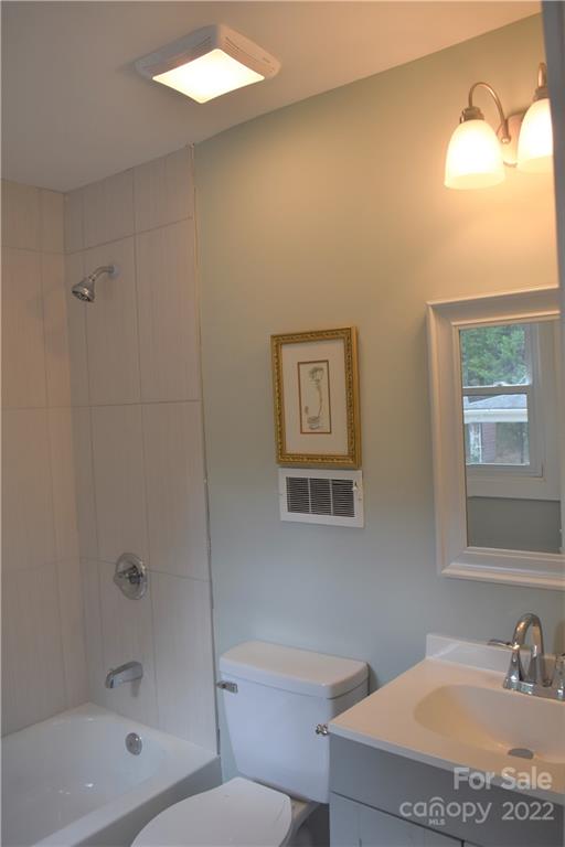 1301 Jackson Road Gastonia, NC 28052 - Photo 38 of 44 a bathroom with a granite countertop sink a toilet and shower