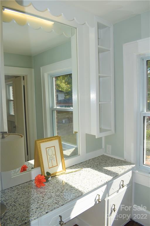 1301 Jackson Road Gastonia, NC 28052 - Photo 40 of 44 a bathroom with a granite countertop sink and a mirror